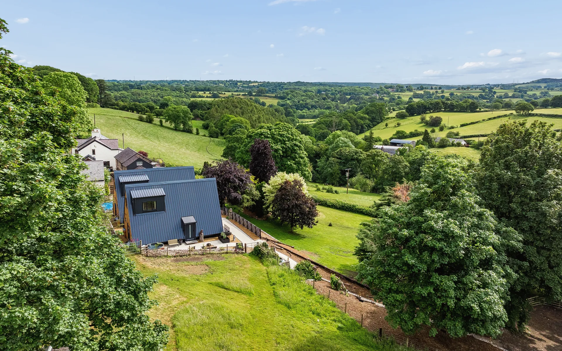Aerial view of Owl Lodges and the surrounding Clwydian countryside